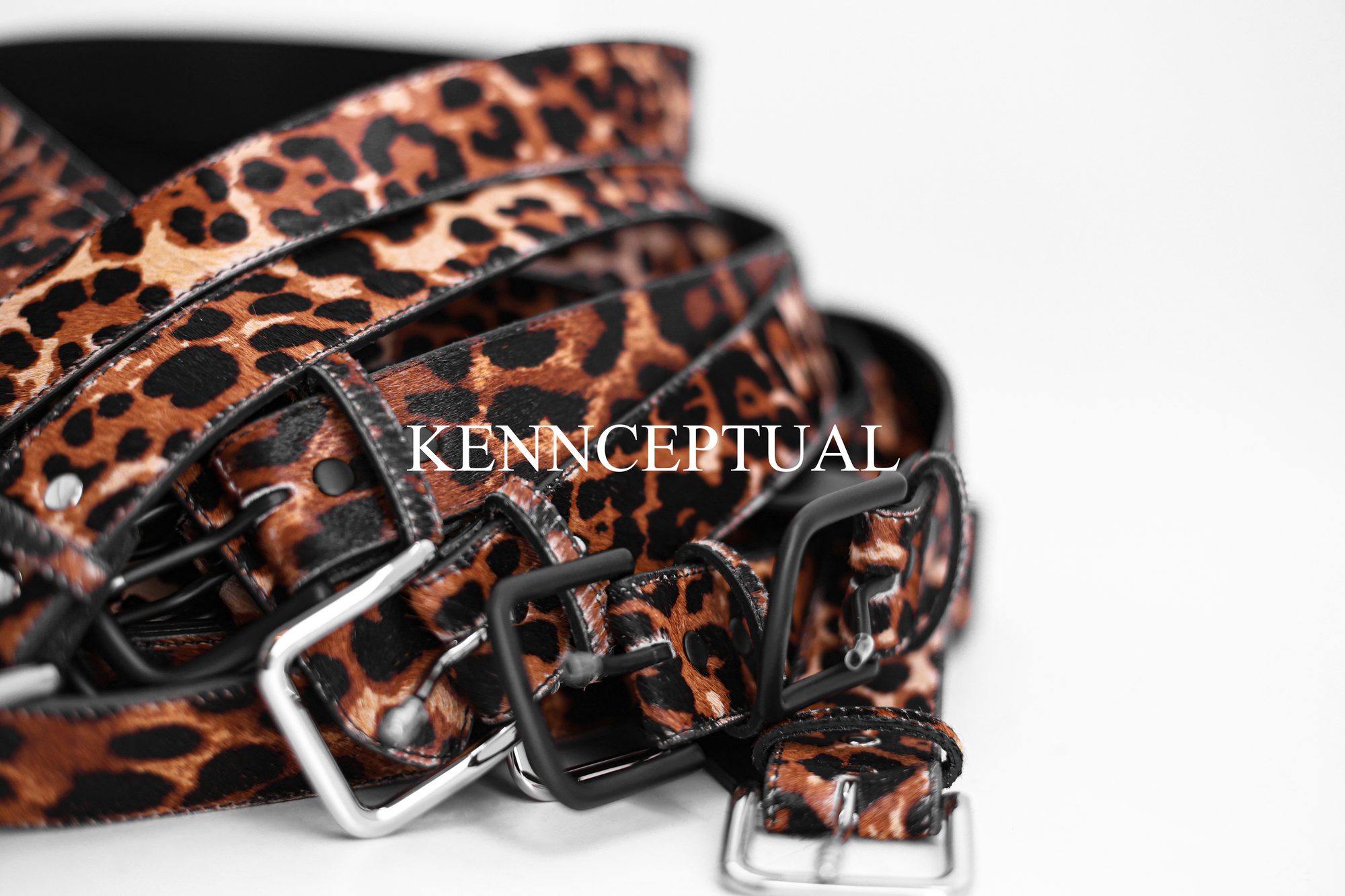 Kennceptual leopard calf hair belt, hand cut with black hardware